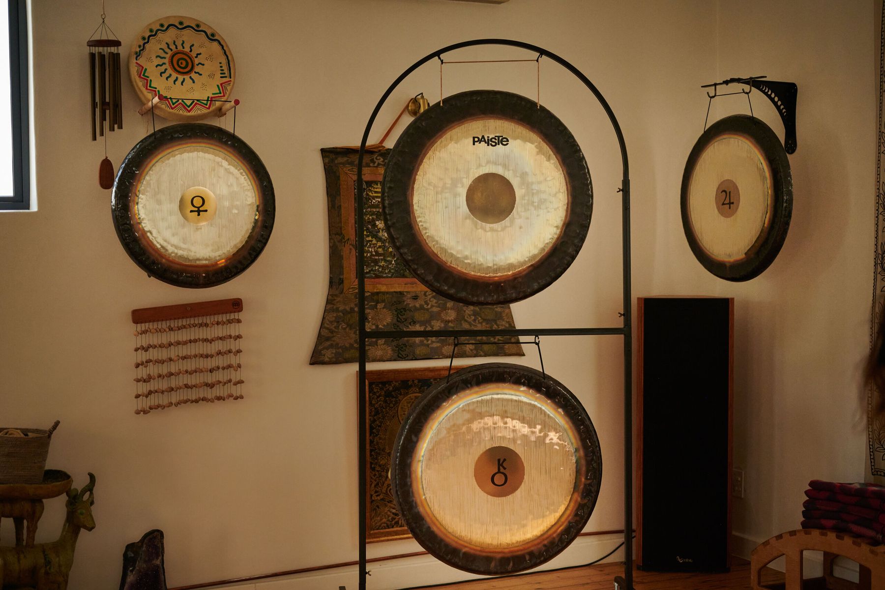 Paiste gongs on stands and wall mounts in the ShangriLa studio